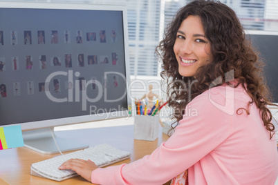 Smiling editor at her desk