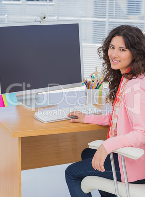 Happy woman working in creative office