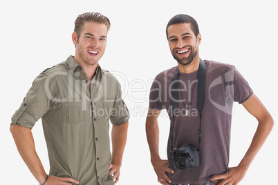 Photographer and his friend smiling at camera