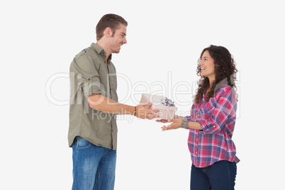 Man offering his friend a present