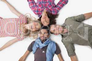 Overhead of friends lying in a circle
