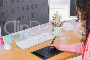 Editor using graphics tablet to edit
