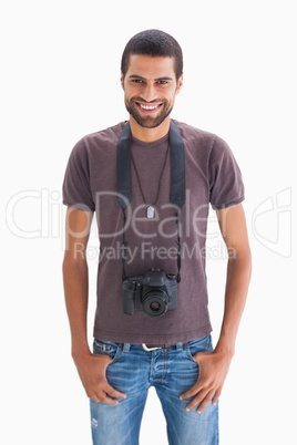 Handsome man with camera around his neck