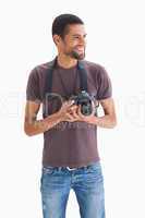 Smiling man with camera around his neck