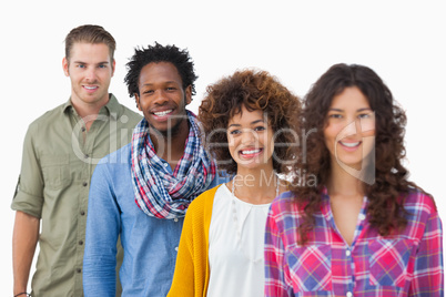 Fashionable friends standing in a row