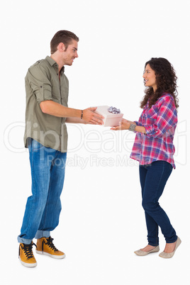 Woman taking present from a friend