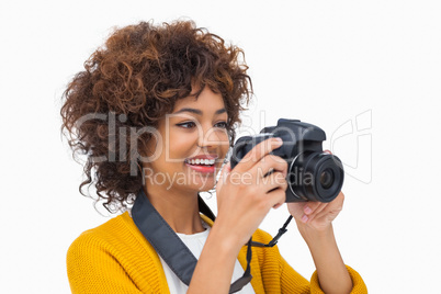 Happy girl taking a photo