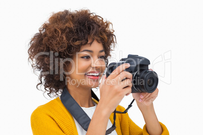 Happy girl taking a photo Happy girl taking a photo