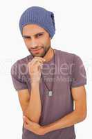 Thinking man wearing beanie hat