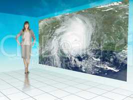 Businesswoman standing next to futuristic screen showing weather