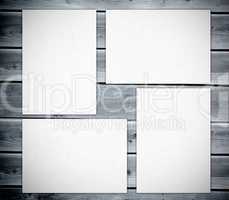 White posters against  wooden boards
