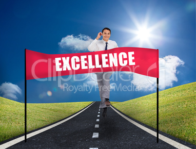 Businessman reaching a banner with excellence written on it