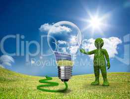 Green character showing a light bulb