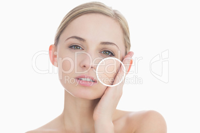 Pure woman touching her skin with close up of her wrinkles
