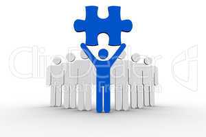 Leader holding blue jigsaw piece next to line of human forms