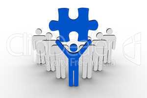 Leader holding blue jigsaw piece next to line of human figures
