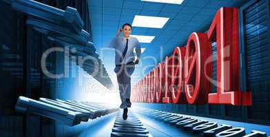 Businessman racing through data center