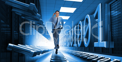 Businessman sprinting through data center