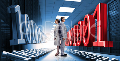 Business people standing in data center with binary code