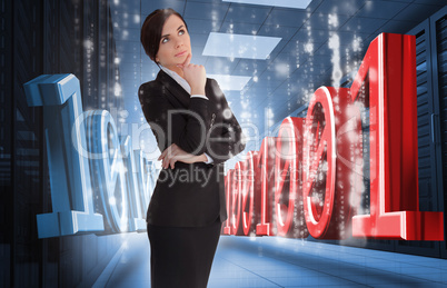 Businesswoman thinking of binary code in data center