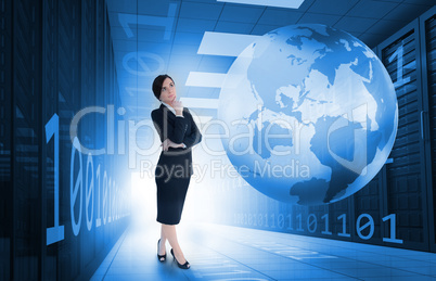 Businesswoman standing in data center with earth and binary code