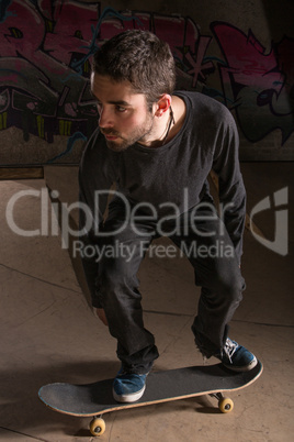 Skater bending his knees for balance