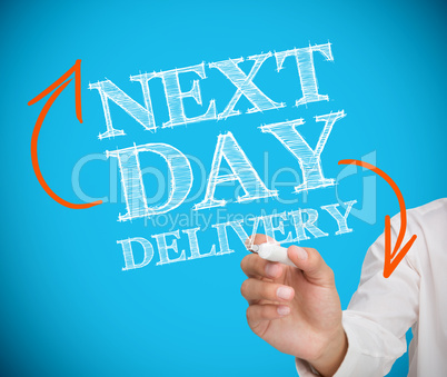 Businesswoman writing next day delivery