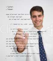 Smiling businessman writing in sql language