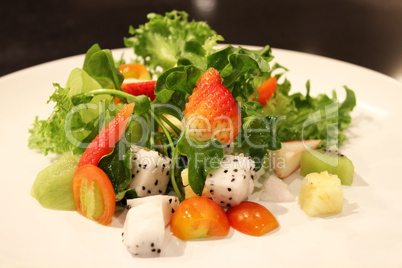 fruit salad with fresh strawberries and kiwi