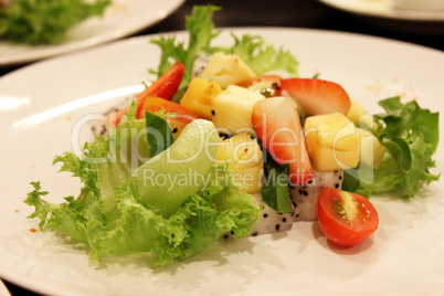 fruit salad with fresh strawberries and kiwi