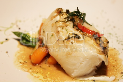 delicious Roasted fish with creamy sauce