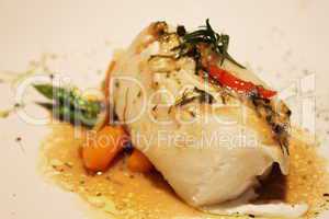 delicious Roasted fish with creamy sauce