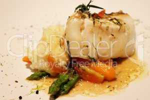 delicious Roasted fish with creamy sauce