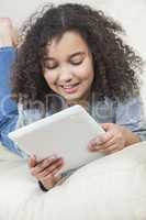 Mixed Race African American Girl Using Tablet Computer