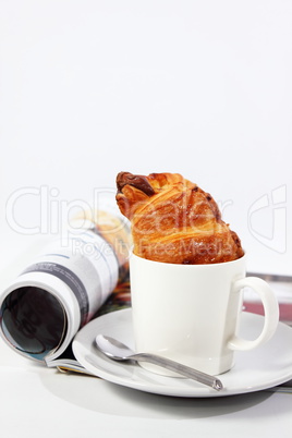 Coffee and magazine on a white