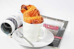 Coffee and magazine on a white