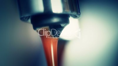 coffee machine pouring espresso extremely close-up