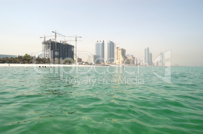 View from the sea on beach and buildings of the luxury hotels, A