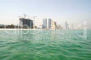 View from the sea on beach and buildings of the luxury hotels, A