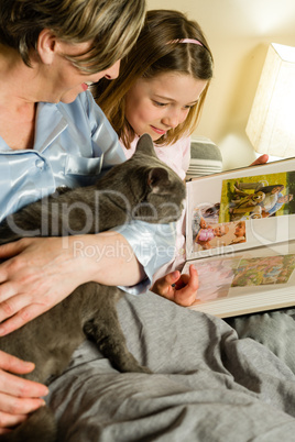 Old woman and granddaughter spending time together