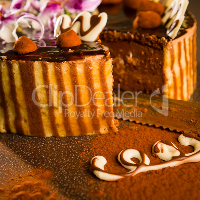Layered chocolate coating cake and knife