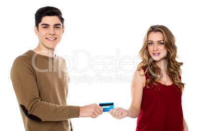 Boyfriend handing over the credit card to his girl