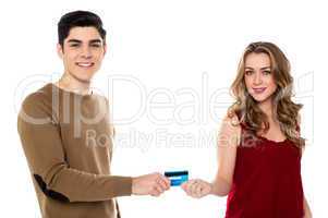 Boyfriend handing over the credit card to his girl