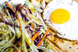 Fried egg and coleslaw, rich breakfast
