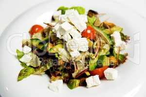 Summer salad with toppings of feta cheese