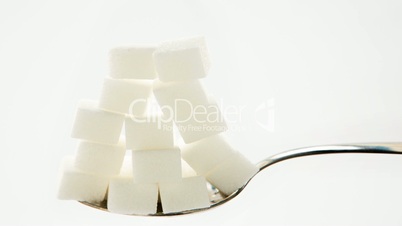 Sugar cubes vanishing from teaspoon