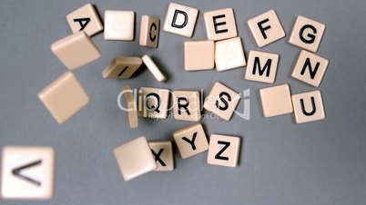 Plastic letters bouncing and showing the alphabet