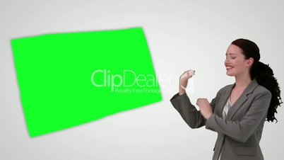 Animation of smiling businesswoman presenting a green screen