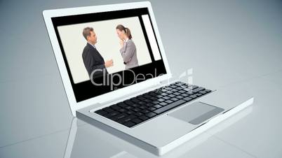 Business montage on a sliding laptop
