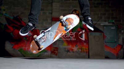 Close up of skater doing double flip trick